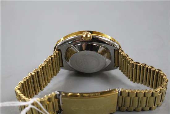 A gentlemans gilt stainless steel Rado Diastar automatic day/date wrist watch.